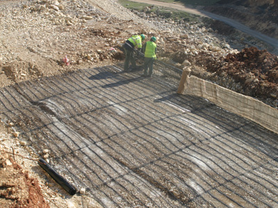 Reinforced-steep-slope-with-geogrids-Tenax-TT-400x300