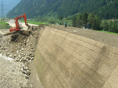 Rockfall-protection-embankment-reinforced-with-geogriod-Tenax-TT